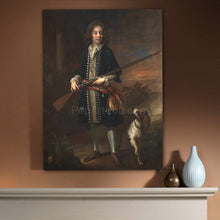 Load image into Gallery viewer, A portrait of a man dressed in historical royal clothes holding a gun standing next to a dog hangs on a beige wall
