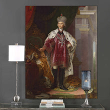 Load image into Gallery viewer, A portrait of a man with long white hair dressed in regal attire with a crown hangs on the gray wall next to a candle