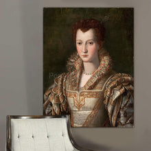 Load image into Gallery viewer, Portrait of a woman with red hair dressed in regal attire hangs on a gray wall near a white chair