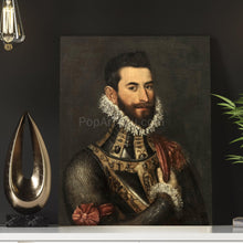Load image into Gallery viewer, A portrait of a man dressed in historical royal clothes stands on a white table against a gray wall