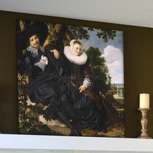 Load image into Gallery viewer, Portrait of a couple dressed in historical black clothes stands on a white table near a candle