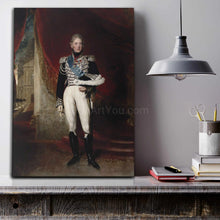 Load image into Gallery viewer, On the table next to the books is a portrait of an elderly man dressed in historical royal clothes