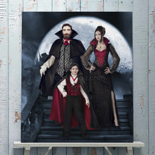 Load image into Gallery viewer, Portrait of a vampire family dressed in historical red clothes stands on a wooden shelf