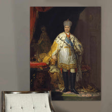 Load image into Gallery viewer, A portrait of an elderly man dressed in gold royal attire with a crown hangs on the gray wall above the chair