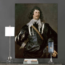 Load image into Gallery viewer, A portrait of a man with a mustache dressed in black royal clothes hangs on the gray wall next to the lamp