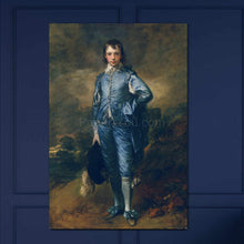 Load image into Gallery viewer, Portrait of a boy dressed in blue regal attire hanging on a blue wall
