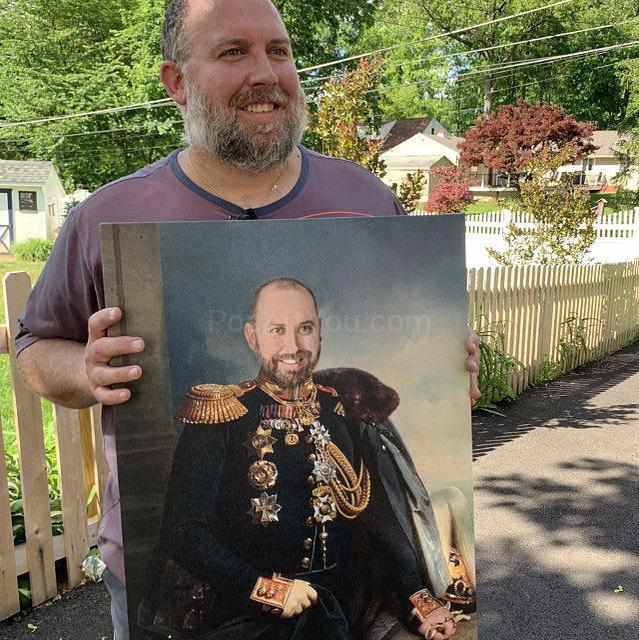 A man holding a portrait of himself, dressed in a historical costume of a general-diplomat