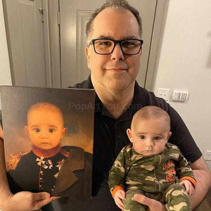А man holds a child in one hand, and in the other hand a portrait of this child dressed in a general's suit