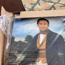 Load image into Gallery viewer, A portrait of a man dressed in a regal renaissance costume lies on the floor