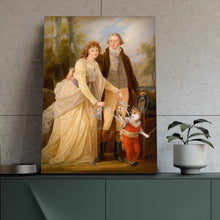 Load image into Gallery viewer, Portrait of a couple dressed in golden regal attires standing near a dog with a human body standing on a green table near a flowerpot