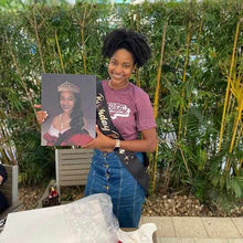 Load image into Gallery viewer, A girl holding a portrait of herself dressed in a royal Princess attire