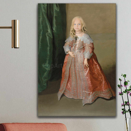 Portrait of a little girl with blond hair wearing an orange royal dress hanging on a white wall