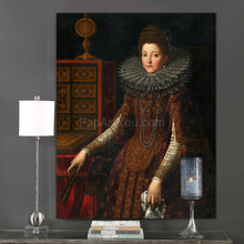 Load image into Gallery viewer, Portrait of a woman with dark hair wearing bronze royal clothes hangs on a gray wall next to a candle
