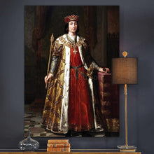 Load image into Gallery viewer, A portrait of a man dressed in gold royal robes hangs on a dark wall above three books
