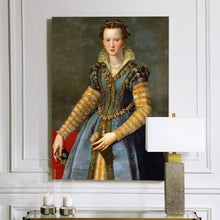 Load image into Gallery viewer, Portrait of a woman with red hair dressed in yellow regal attire hangs on a white wall near two candles
