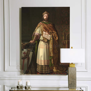 A portrait of a man dressed in historical royal clothes with a crown hangs on a white wall next to two candles