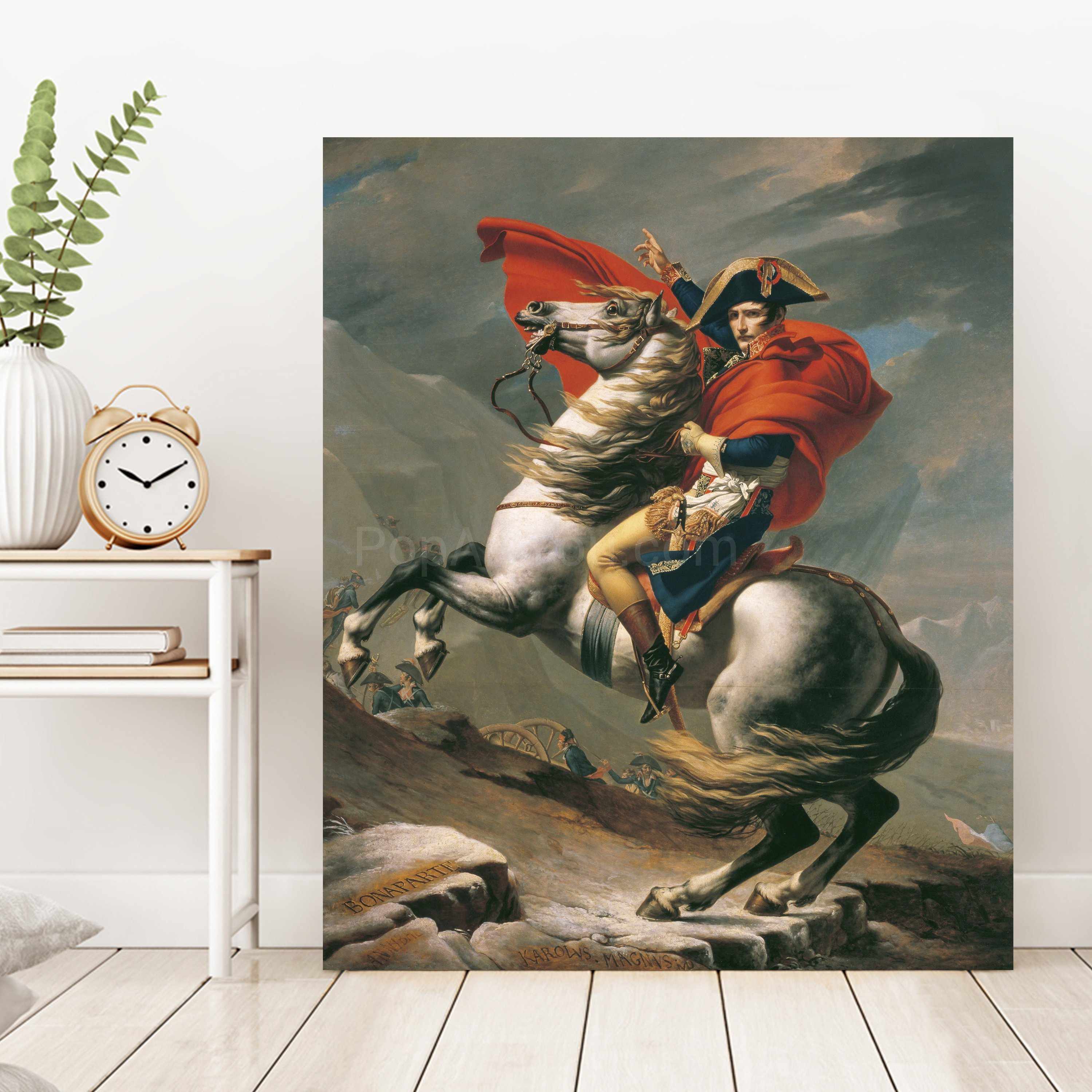 A portrait of a man dressed in renaissance regal attire riding a white horse stands on the wooden floor
