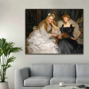 Portrait of two women dressed in black and white dresses hanging on a white wall above the sofa