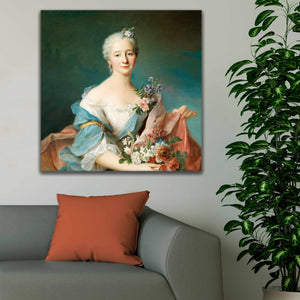 Portrait of a woman with gray hair wearing a royal dress hangs on a gray wall above the sofa