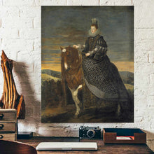 Load image into Gallery viewer, Portrait of a woman riding on a horse dressed in a black royal dress hangs on a white brick wall above a work table
