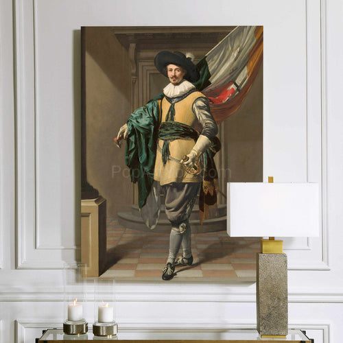 A portrait of a man dressed in historical royal clothes with a black hat hangs on a white wall above a lamp and two candles