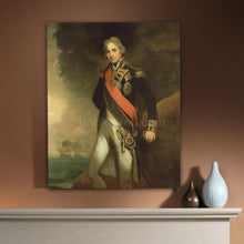Load image into Gallery viewer, A portrait of a man standing on the beach dressed in historical royal clothes hangs on the beige wall above a white table
