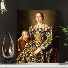 Load image into Gallery viewer, Portrait of a woman dressed in yellow royal clothes standing with a baby standing on a white table
