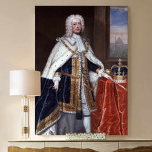 Load image into Gallery viewer, A portrait of a man with long white hair dressed in historical royal clothes hangs on the beige wall above a wooden table
