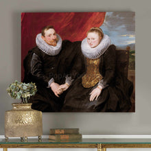 Load image into Gallery viewer, Portrait of a married couple dressed in black royal clothes hangs on a gray wall near a golden vase
