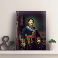 Load image into Gallery viewer, On a shelf against a gray wall is a portrait of a man dressed in a royal costume
