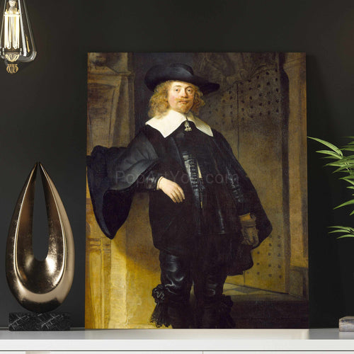 A portrait of a man with long hair dressed in black royal clothes with a hat stands on a white table