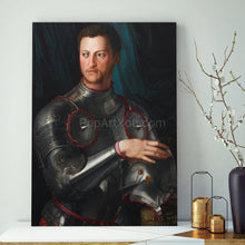 Load image into Gallery viewer, A portrait of a man dressed in regal clothes with armor holding a helmet stands on a white table next to a gray vase
