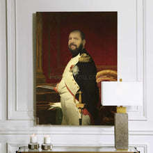 Load image into Gallery viewer, A portrait of a man standing near a red chair dressed in renaissance regal attire hangs on a white wall
