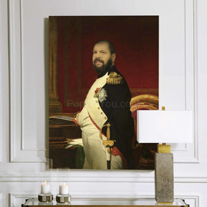 A portrait of a man standing near a red chair dressed in renaissance regal attire hangs on a white wall