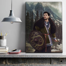 Load image into Gallery viewer, A portrait of a man dressed in a Viking costume holding a shield and an axe stands on a wooden shelf
