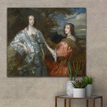 Load image into Gallery viewer, Portrait of two women dressed in royal clothes hanging on a beige wall near cacti
