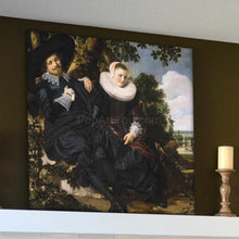 Load image into Gallery viewer, Portrait of a couple dressed in historical black clothes stands on a white table near a candle

