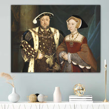 Load image into Gallery viewer, Portrait of an elderly couple dressed in historical regal attire hanging on a blue wall near a candle
