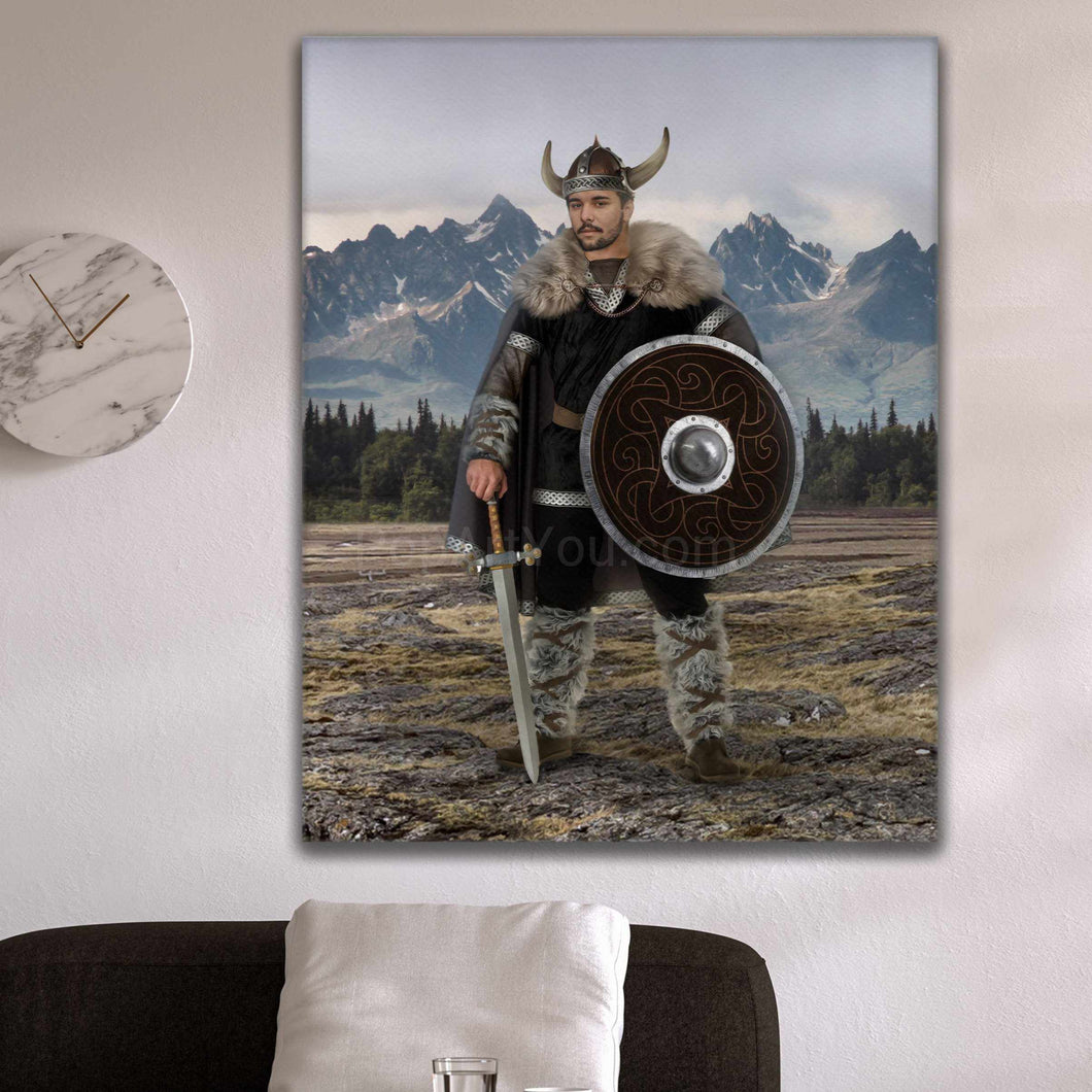 A portrait of a man dressed as a Viking holding a shield and sword hangs on a white wall