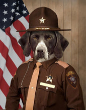 Load image into Gallery viewer, The portrait shows a dog with a hat and a brown sheriff&#39;s attire standing near the American flag
