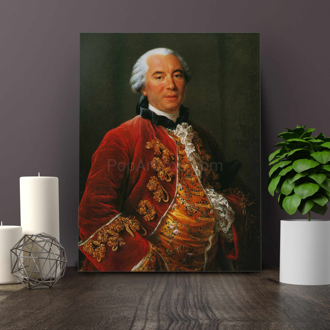 On the table next to the candle stands a portrait of a man dressed in a royal costume