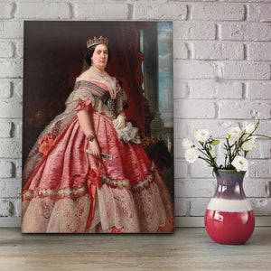 Portrait of a woman with dark hair wearing a pink regal attire with a crown stands on the wooden floor next to flowers in a vase