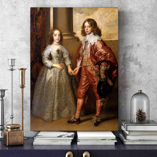 Portrait of two children dressed in historical royal clothes stands on a blue table near books