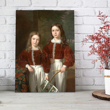 Load image into Gallery viewer, Portrait of two girls dressed in red royal clothes stands on a wooden floor against a background of a white brick wall

