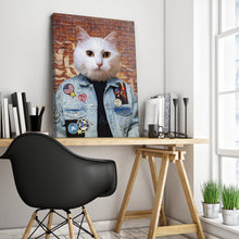 Load image into Gallery viewer, Portrait of a cat with a human body dressed in jeans stands on a wooden table near a black armchair

