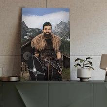 Load image into Gallery viewer, A portrait of a man dressed as a Viking holding a shield stands on a green table
