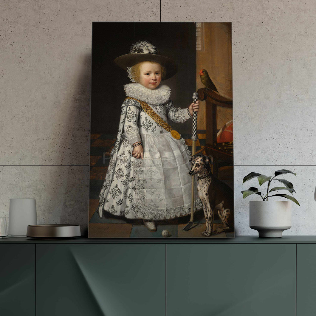 Portrait of a little girl dressed in white royal attire stands on a green table next to a flowerpot