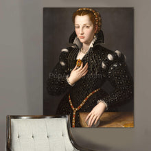 Load image into Gallery viewer, Portrait of a woman with red hair dressed in black royal clothes hangs on a gray wall near a gray chair
