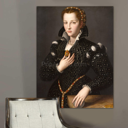 Portrait of a woman with red hair dressed in black royal clothes hangs on a gray wall near a gray chair