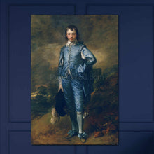 Load image into Gallery viewer, Portrait of a boy dressed in blue regal attire hanging on a blue wall
